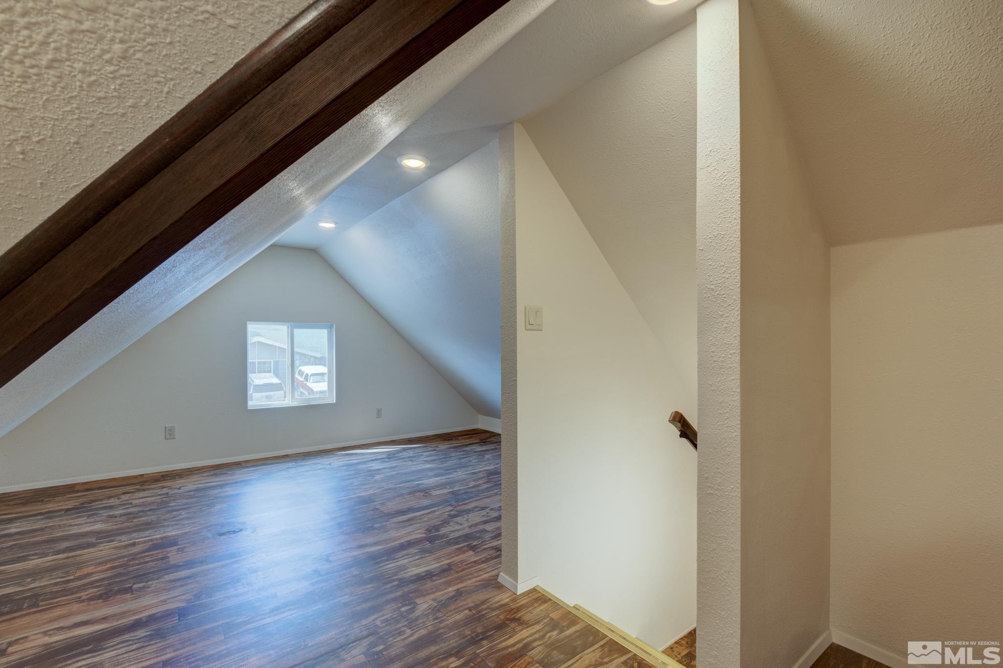 1700 O Farrell Street Reno, NV 89503 - Photo 18 of 22 a view of an empty room with wooden floor and a window