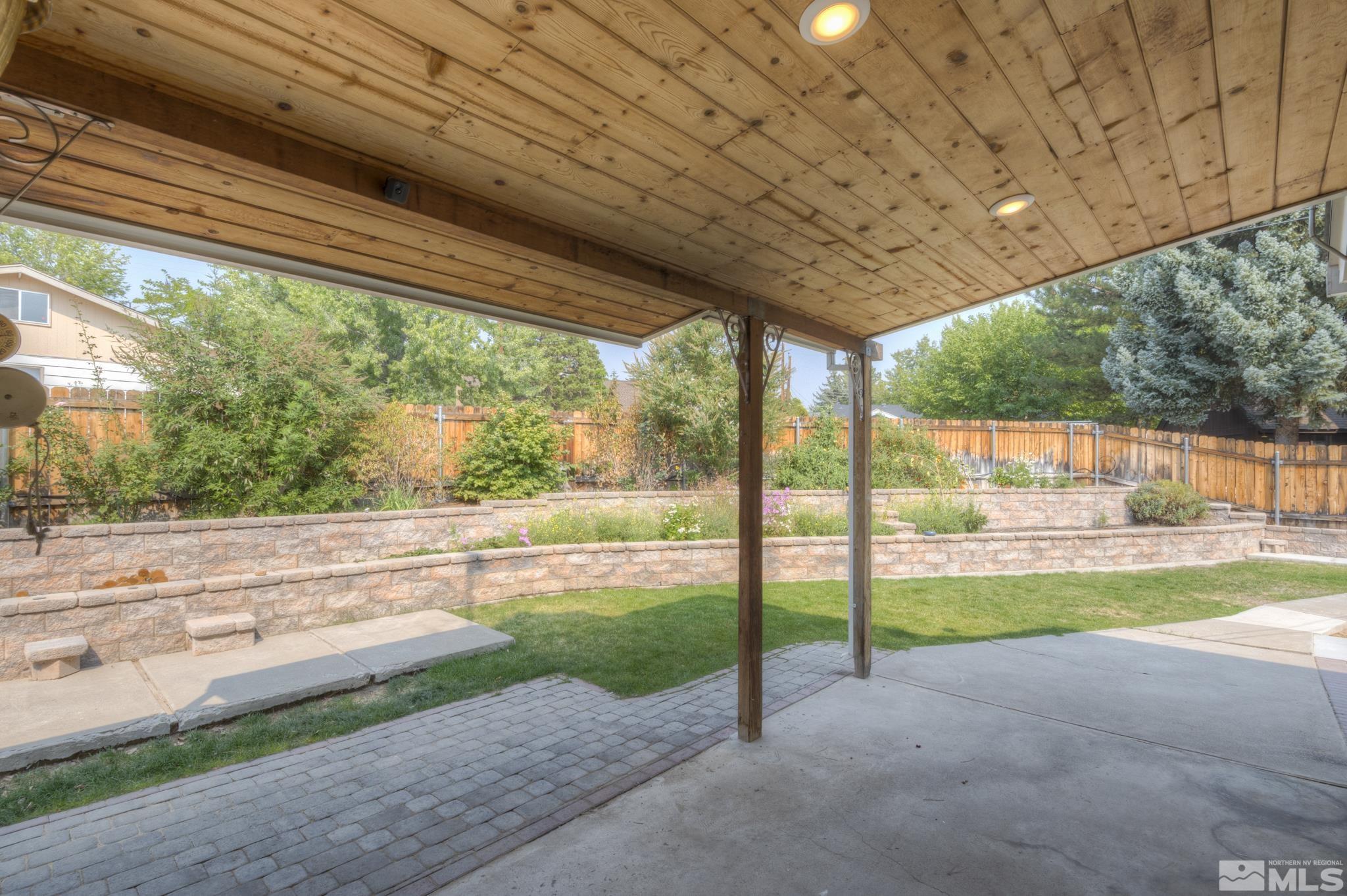 1700 O Farrell Street Reno, NV 89503 - Photo 19 of 22 a view of a house with a backyard and a patio