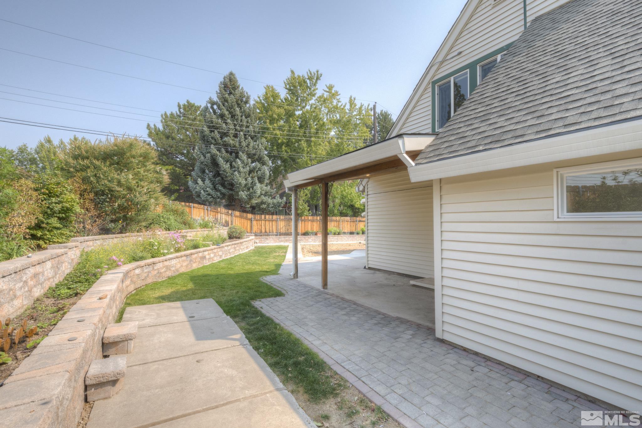 1700 O Farrell Street Reno, NV 89503 - Photo 20 of 22 a view of a backyard with a garden