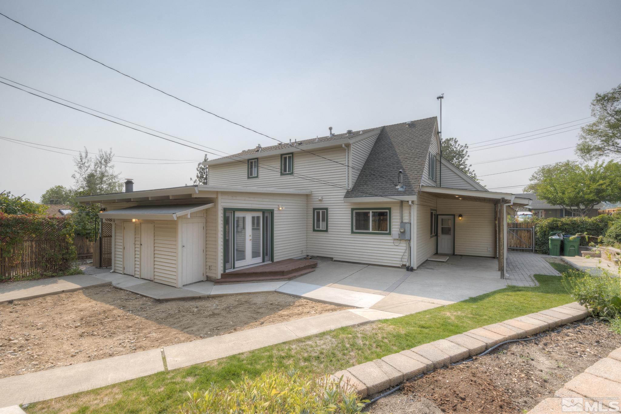 1700 O Farrell Street Reno, NV 89503 - Photo 22 of 22 a view of a house with a yard and large tree