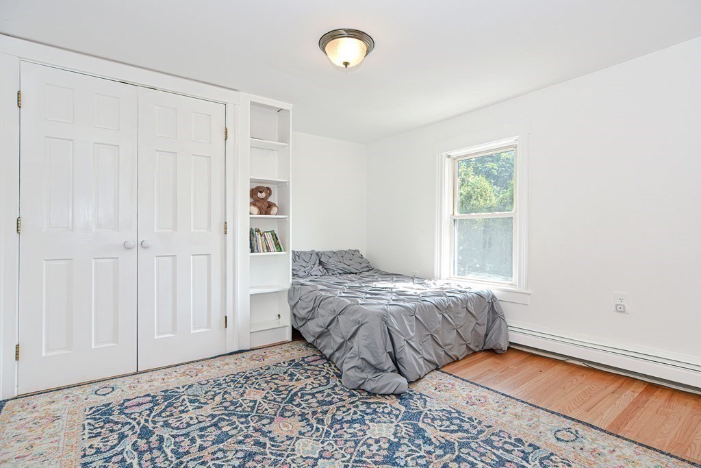 53 Frairy Street Medfield, MA 02052 - Photo 14 of 42 a bedroom with a bed and a window