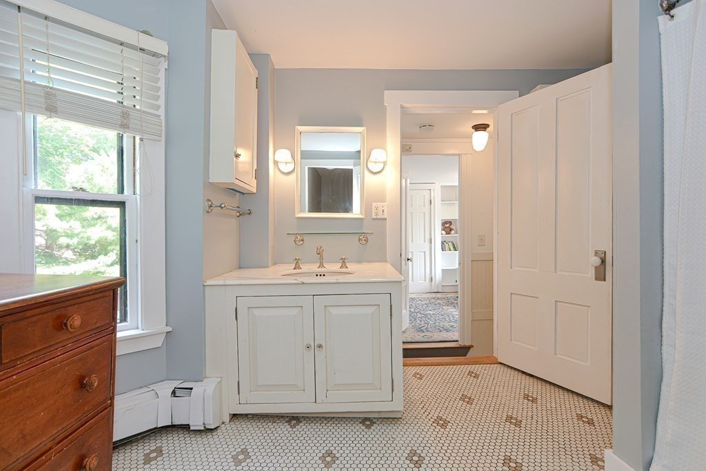 53 Frairy Street Medfield, MA 02052 - Photo 18 of 42 a bathroom with a sink and a mirror