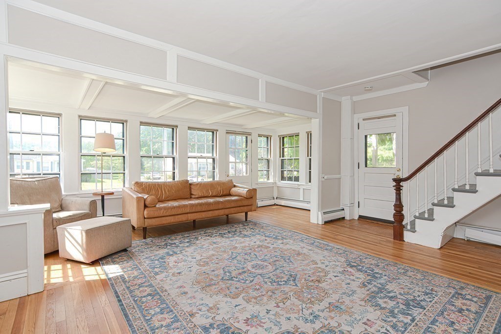 53 Frairy Street Medfield, MA 02052 - Photo 2 of 42 a living room with furniture and a large window