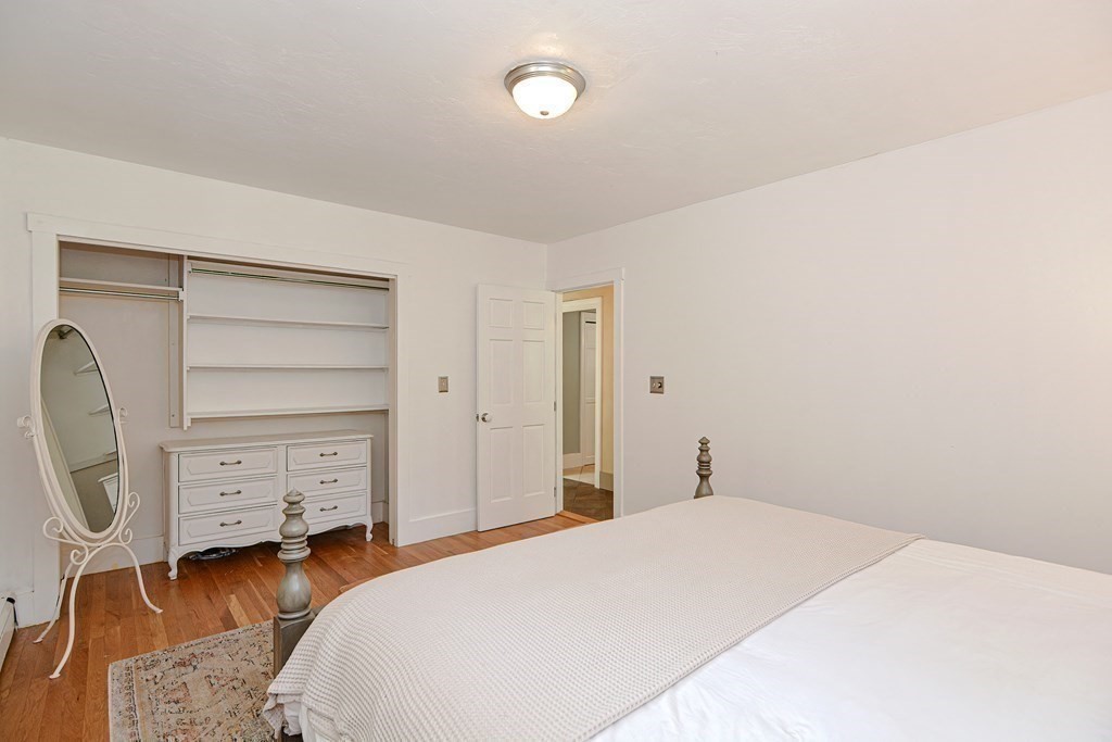 53 Frairy Street Medfield, MA 02052 - Photo 21 of 42 a bedroom with a bed and furniture