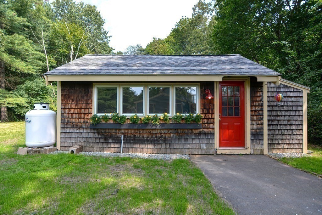 53 Frairy Street Medfield, MA 02052 - Photo 29 of 42 a front view of a house with garden