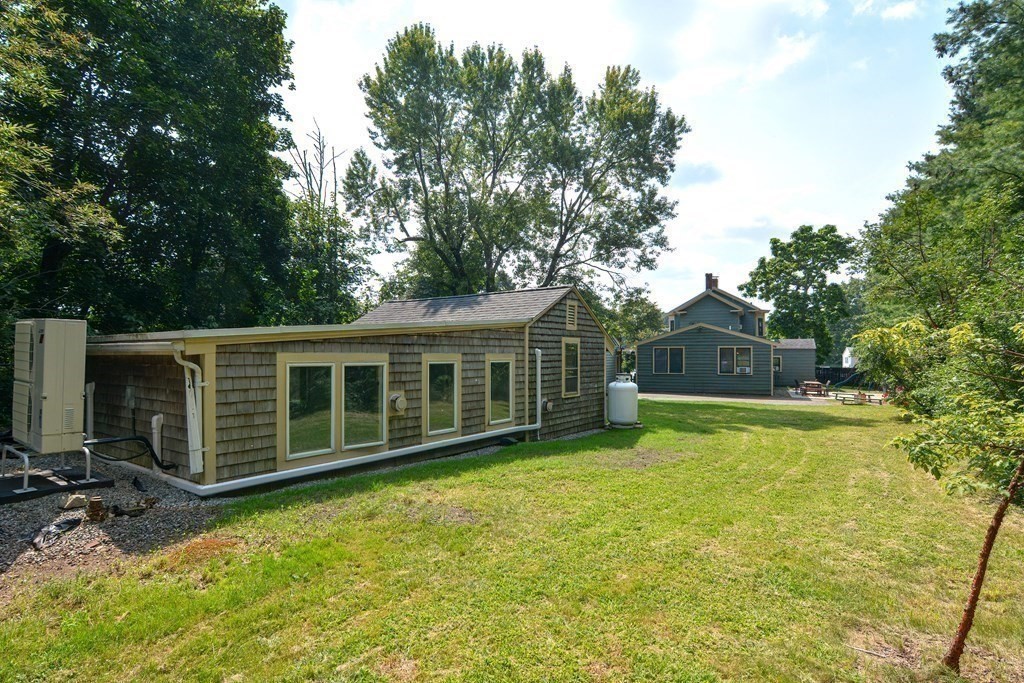53 Frairy Street Medfield, MA 02052 - Photo 34 of 42 a front view of a house with a yard