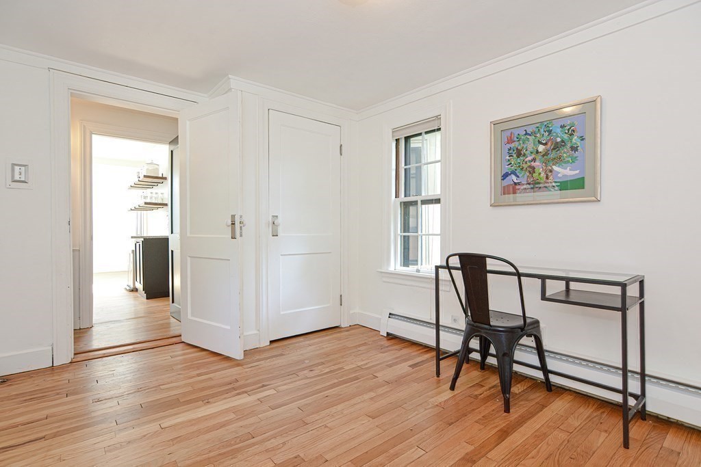 53 Frairy Street Medfield, MA 02052 - Photo 8 of 42 a view of a livingroom with furniture and wooden floor