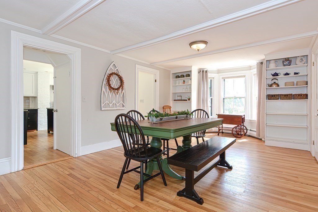 53 Frairy Street Medfield, MA 02052 - Photo 9 of 42 a view of a dining room with furniture and wooden floor
