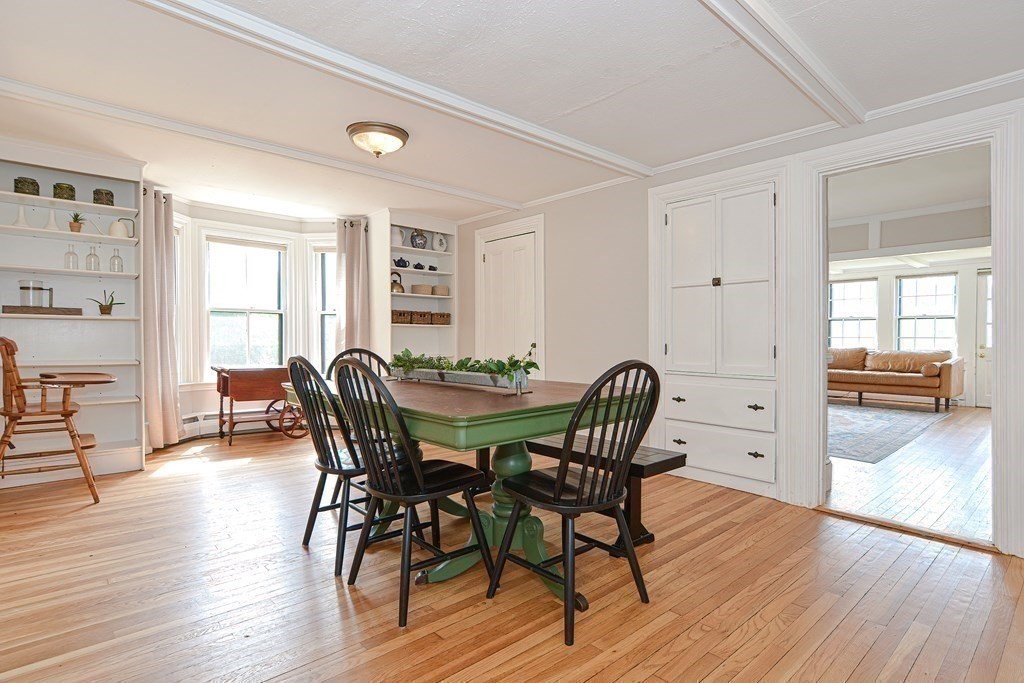 53 Frairy Street Medfield, MA 02052 - Photo 10 of 42 a view of a dining room with furniture and wooden floor