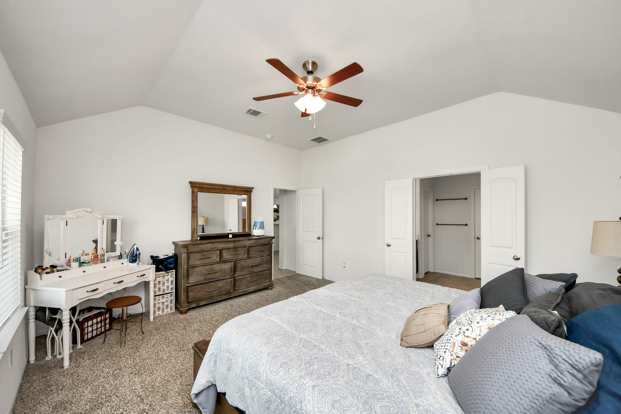 6226 Mason Way Rosenberg, TX 77471 - Photo 14 of 30 a bedroom with a bed and ceiling fan