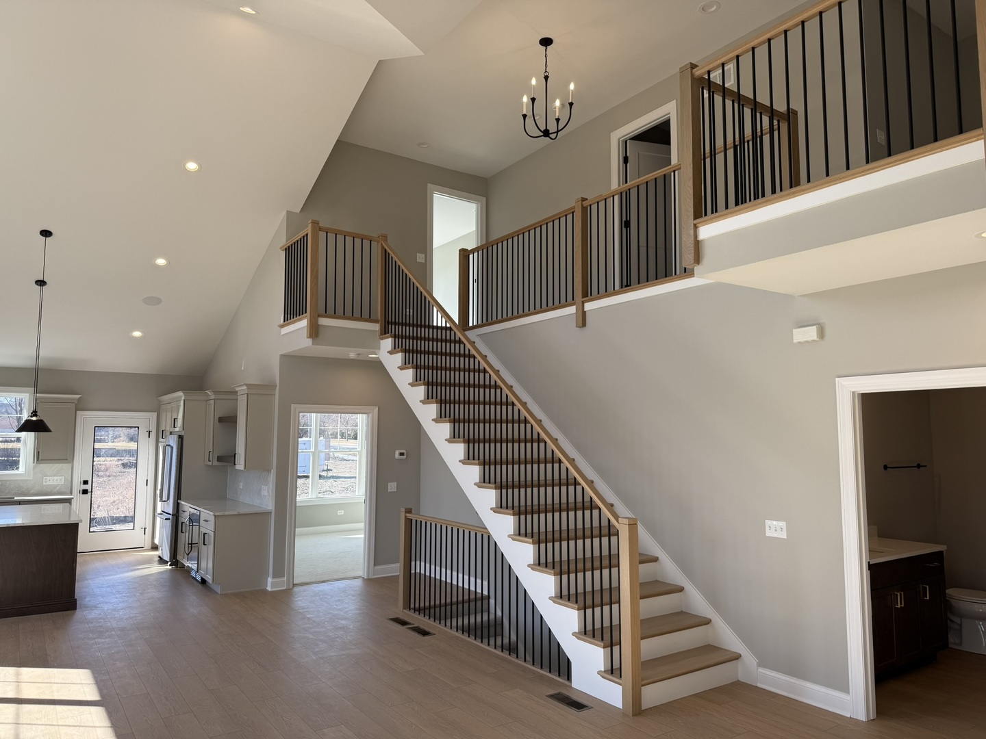 1204 Prairie Lane Lemont, IL 60439 - Photo 5 of 29 a view of entryway and hall with wooden floor