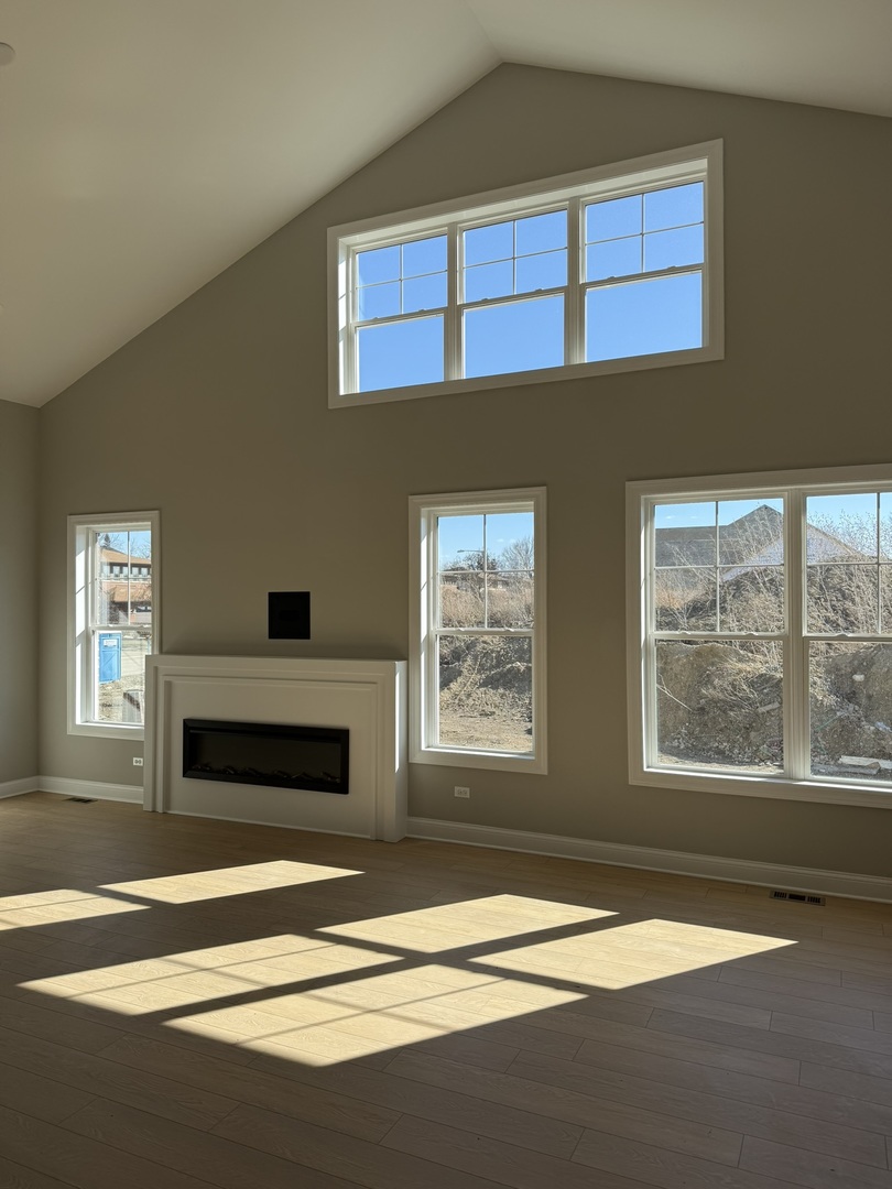 1204 Prairie Lane Lemont, IL 60439 - Photo 6 of 29 a bedroom with a bed and a window