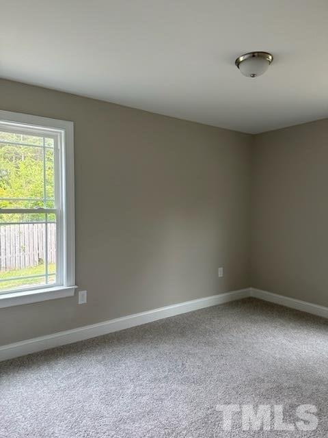 404 Pineview Road Clinton, NC 28328 - Photo 11 of 16 a view of an empty room with a window
