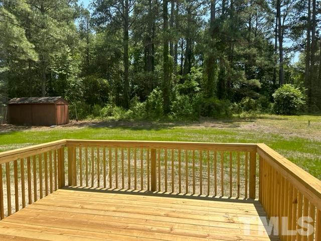 404 Pineview Road Clinton, NC 28328 - Photo 16 of 16 a view of a balcony with wooden floor