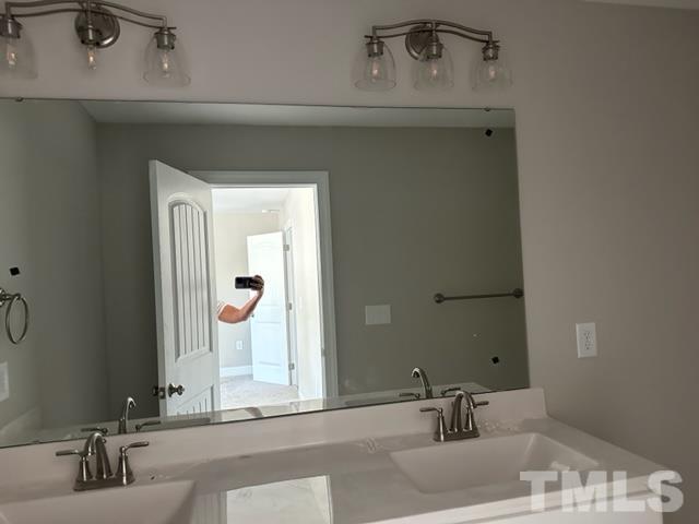 404 Pineview Road Clinton, NC 28328 - Photo 3 of 16 a bathroom with a sink and a mirror