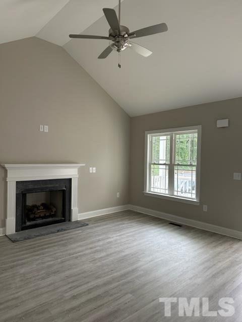 404 Pineview Road Clinton, NC 28328 - Photo 6 of 16 an empty room with windows and a fireplace