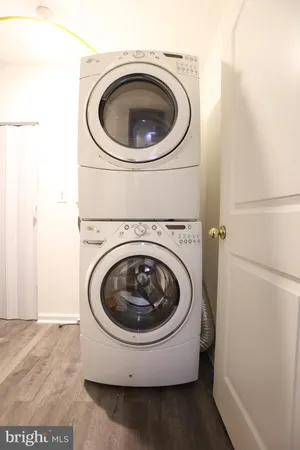 a view of an empty room and closet area