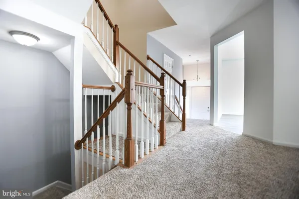 a view of hallway with stairs