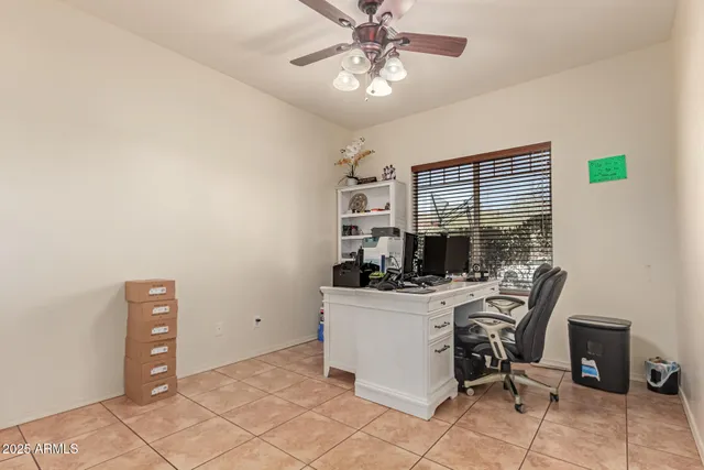 a view of a workspace with furniture
