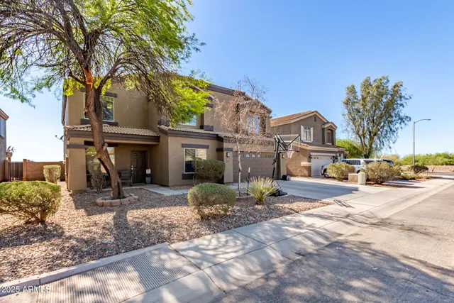 a view of a street with a building in the background