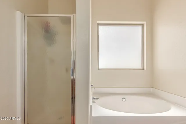 a bathroom with a bathtub