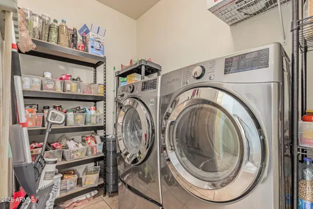 a storage room with washer and dryer