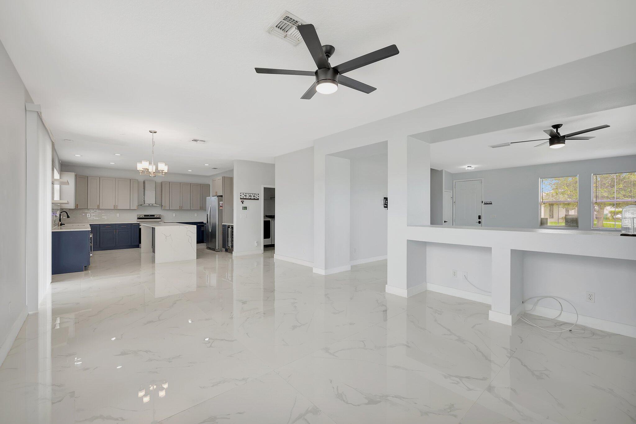 6509 Northwest Omega Road Port St. Lucie, FL 34983 - Photo 8 of 58 Living Room
