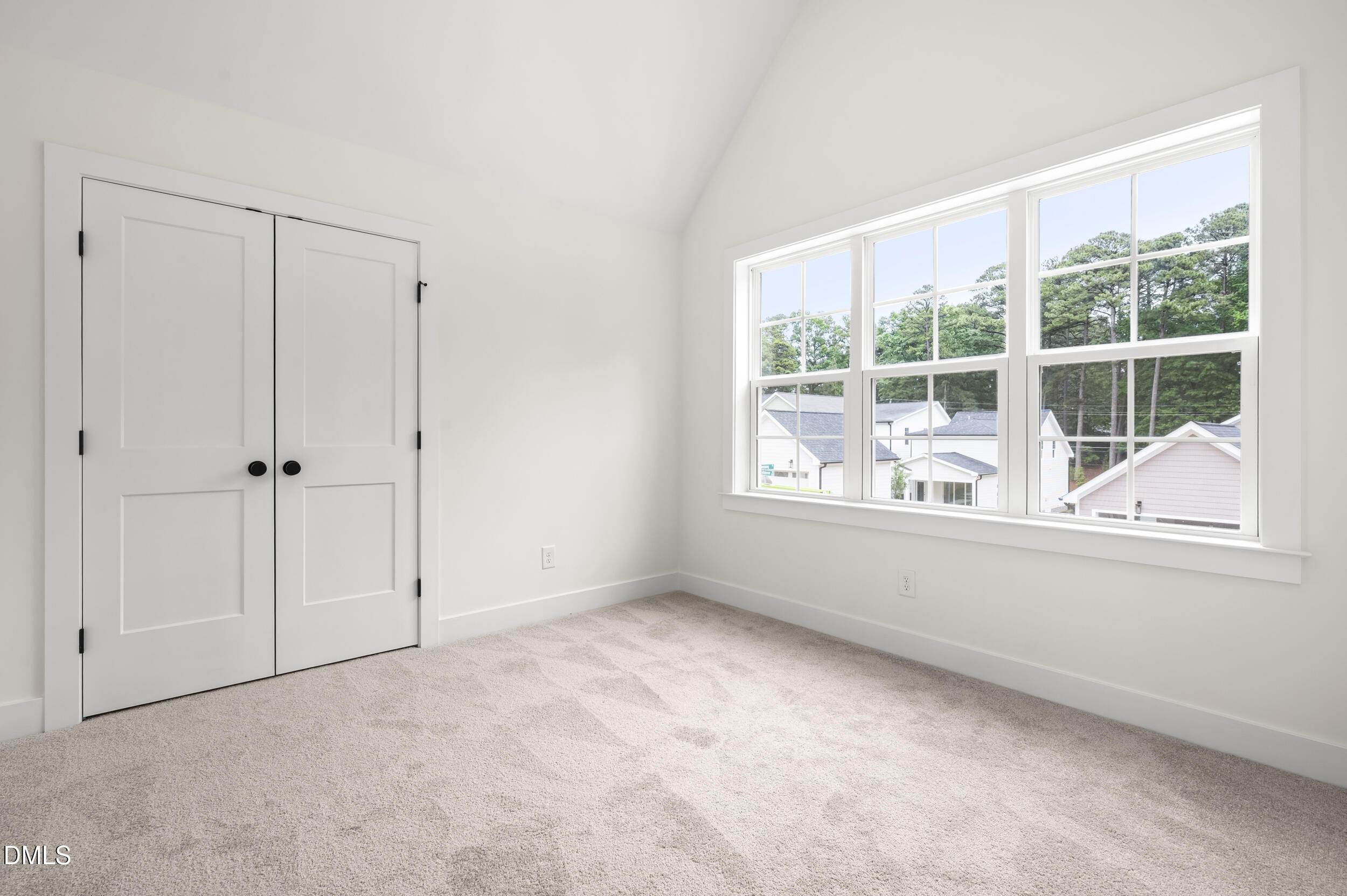 708 Grayhaven Place Raleigh, NC 27606 - Photo 22 of 33 an empty room with windows