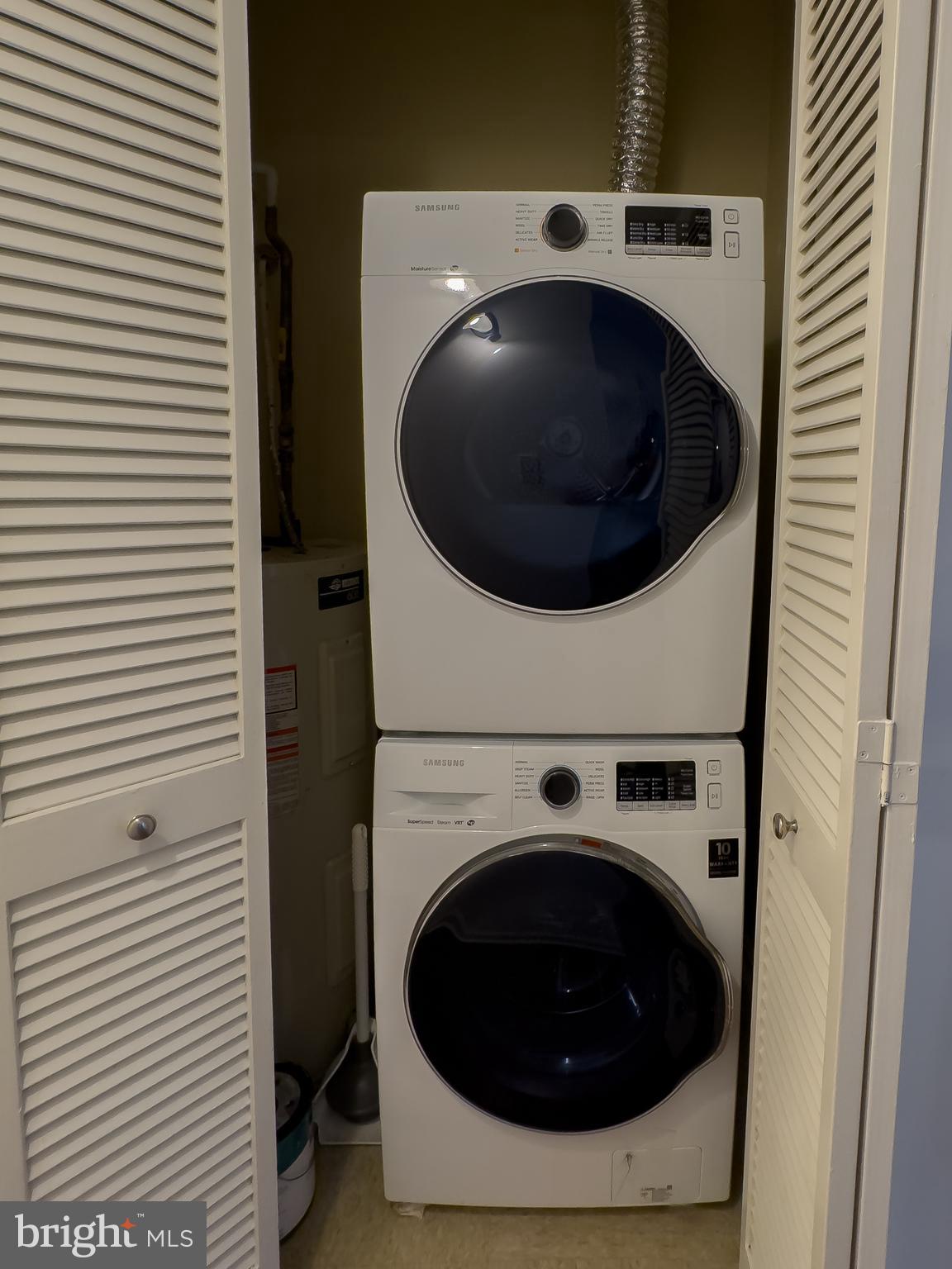 3178 Summit Square Drive, Unit 3C9 Oakton, VA 22124 - Photo 20 of 21 a utility room with dryer and washer