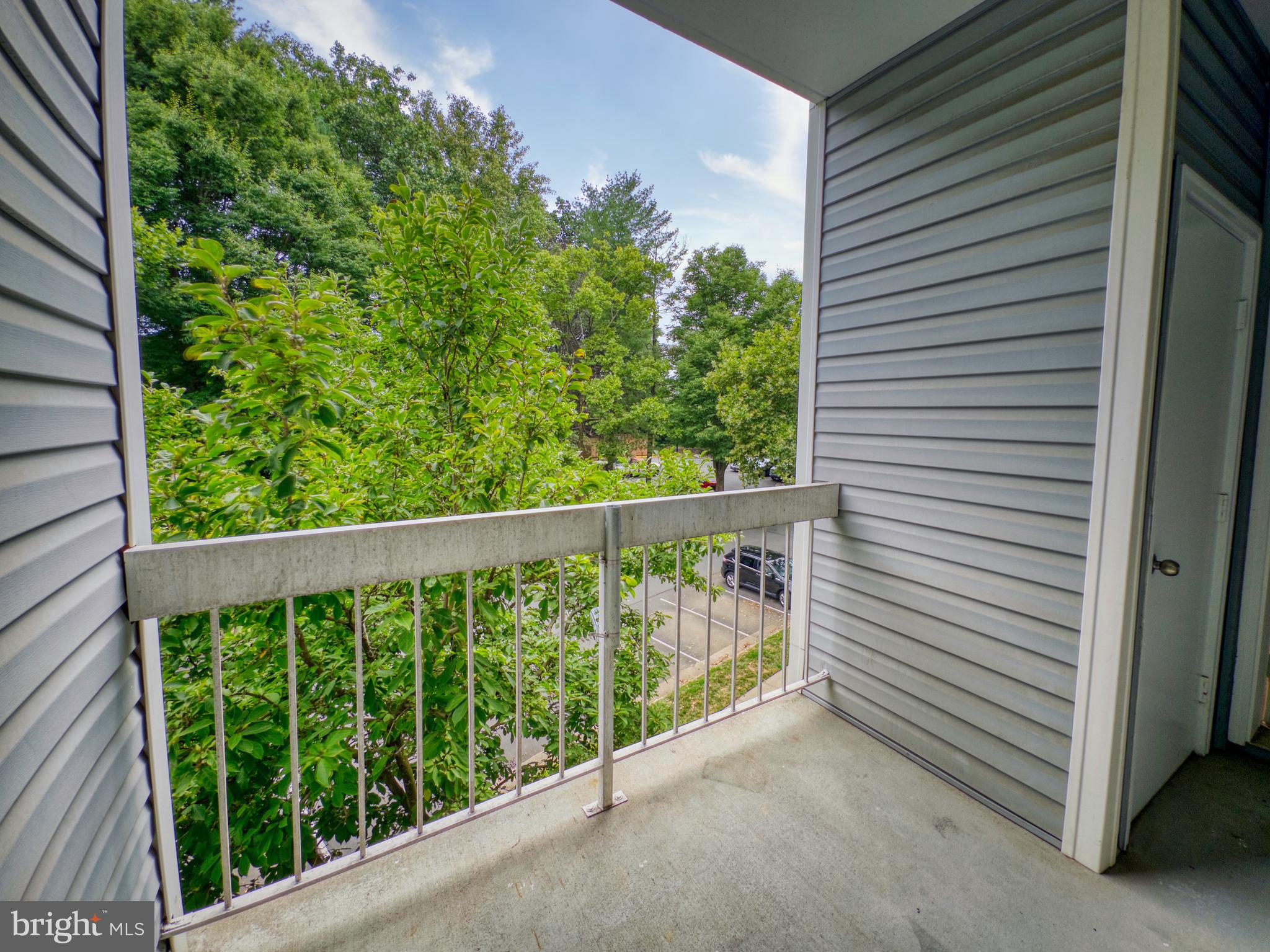 3178 Summit Square Drive, Unit 3C9 Oakton, VA 22124 - Photo 21 of 21 a view of a balcony with plants