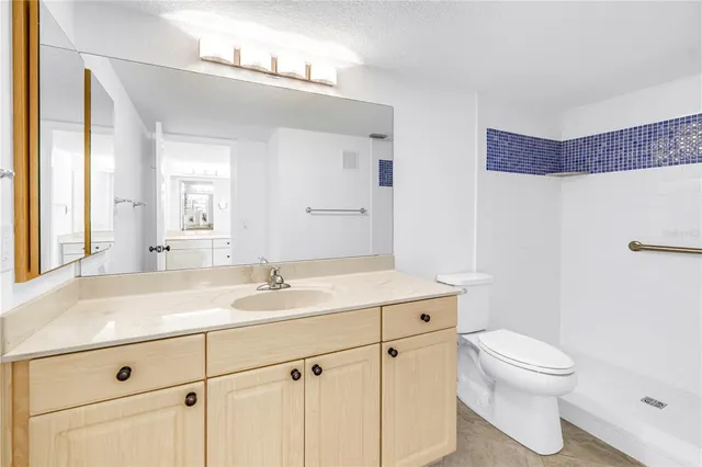 a swimming pool with outdoor seating and yard