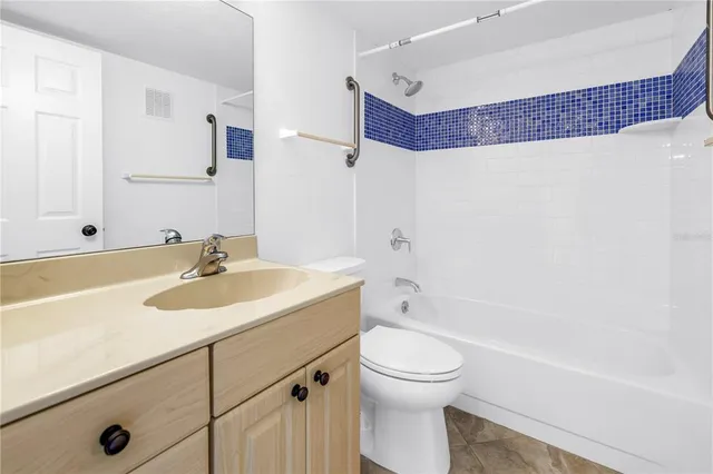 a view of a park with swings and slides