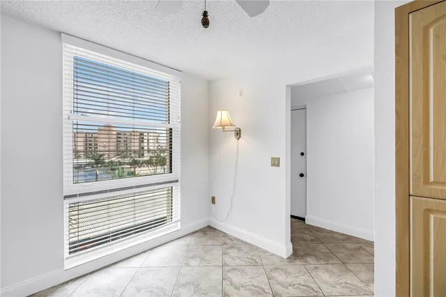 a kitchen with a stove a sink and a refrigerator