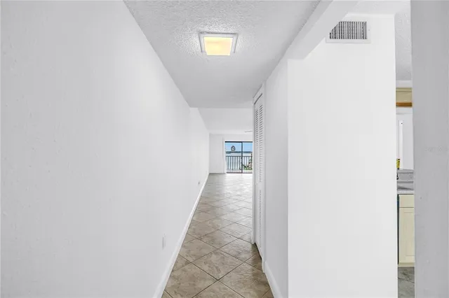 a view of a porch and garden