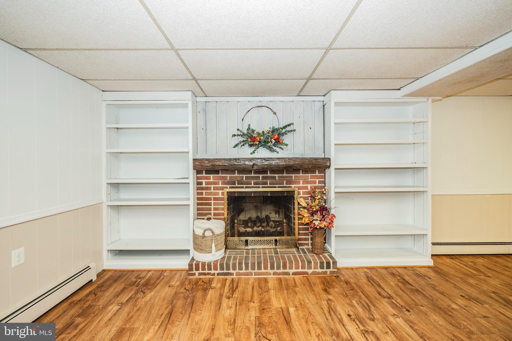 10930 Riverview Road Fort Washington, MD 20744 - Photo 29 of 64 Lower Level - Family Room w/ Brick Fireplace