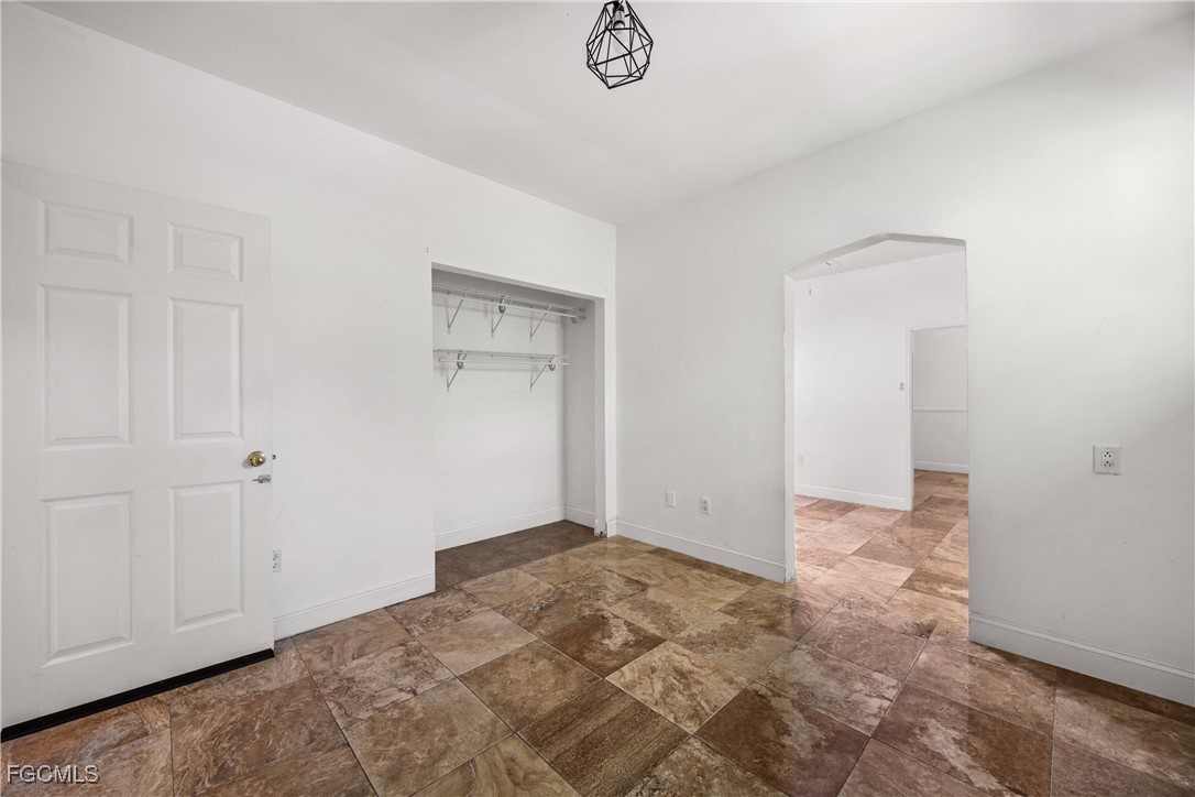 360 18th Street Northeast Naples, FL 34120 - Photo 19 of 37 a view of an empty room