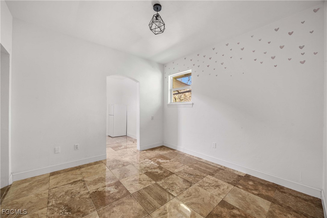 360 18th Street Northeast Naples, FL 34120 - Photo 20 of 37 a view of an empty room