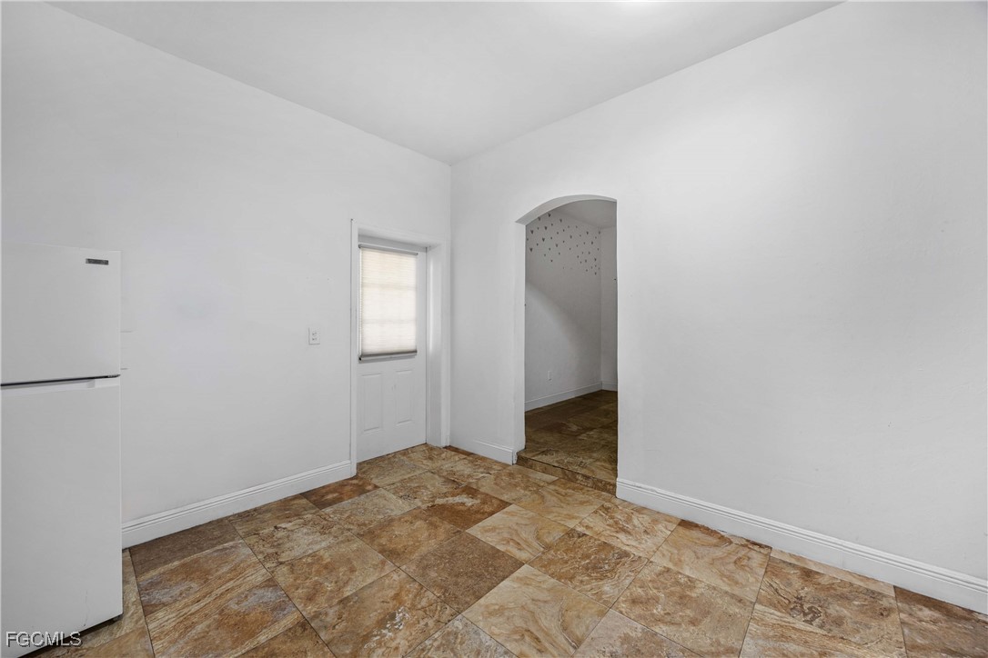 360 18th Street Northeast Naples, FL 34120 - Photo 24 of 37 a view of an empty room