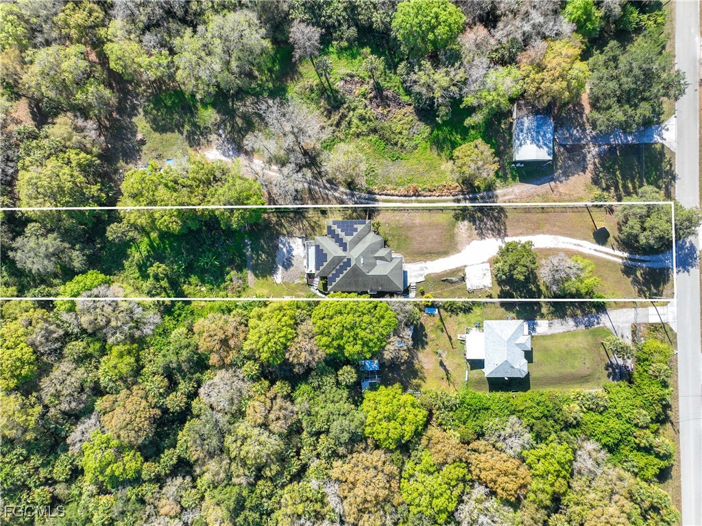 360 18th Street Northeast Naples, FL 34120 - Photo 5 of 37 a view of a lake from a balcony