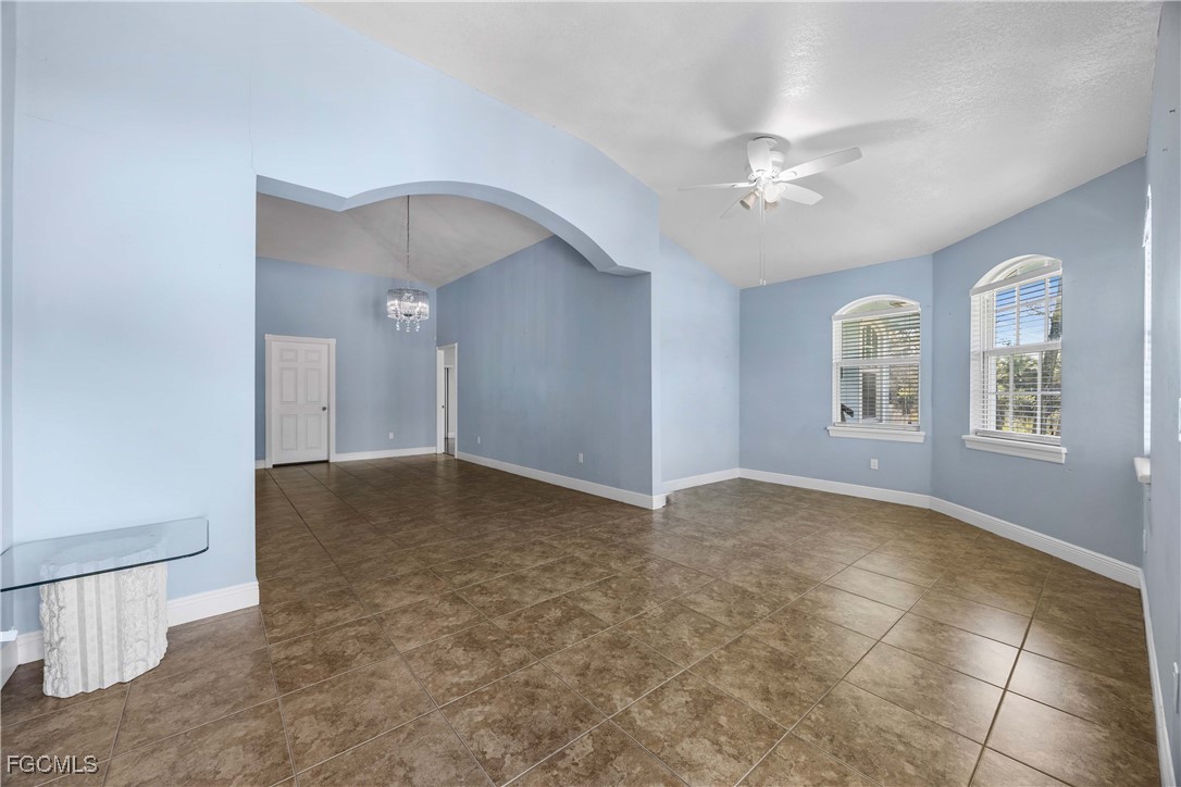360 18th Street Northeast Naples, FL 34120 - Photo 8 of 37 a view of an empty room with a window