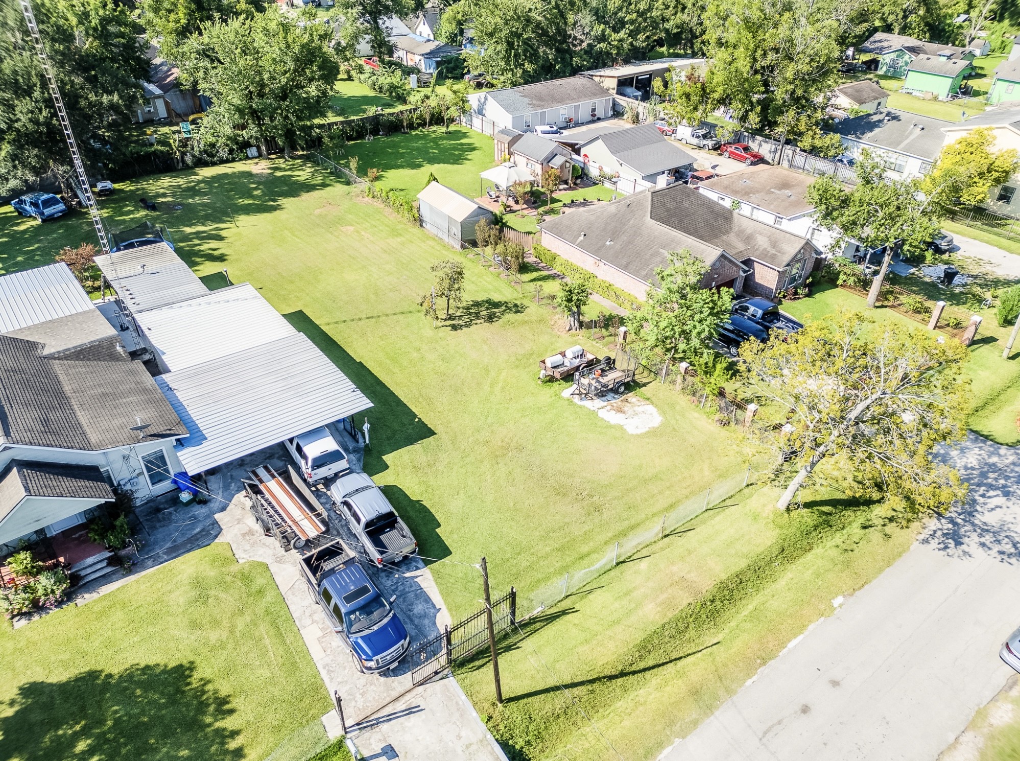 714 Apache Street Houston, TX 77022 - Photo 3 of 4 an aerial view of a house with a swimming pool