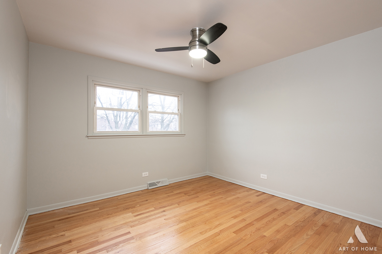 2750 North Linder Avenue, Unit 1 Chicago, IL 60639 - Photo 13 of 13 wooden floor in an empty room with a window