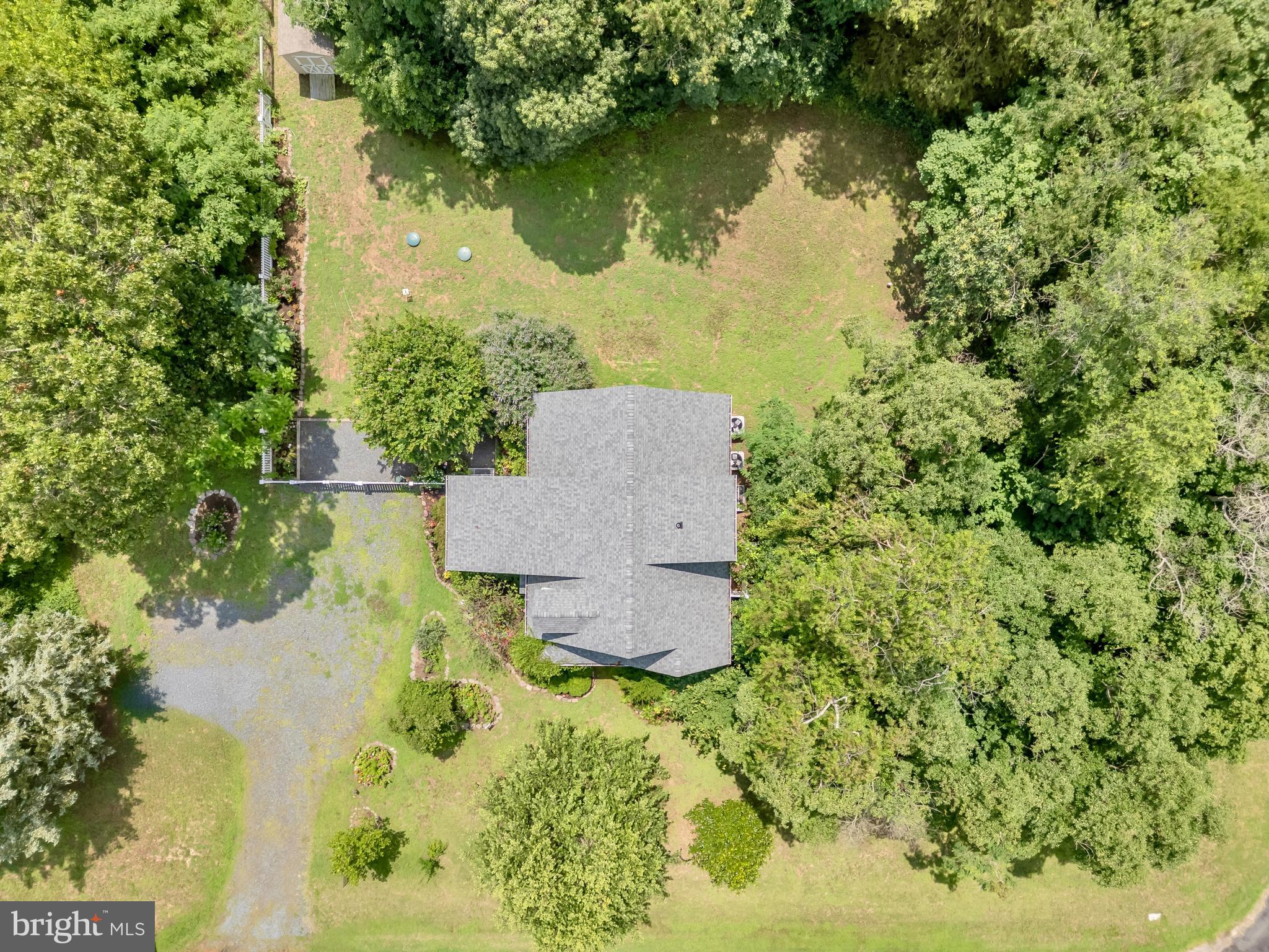 321 Front Street Crumpton, MD 21628 - Photo 36 of 59 an aerial view of residential house with outdoor space and trees all around