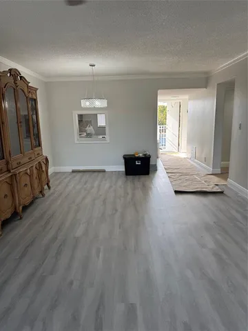 a view of a balcony with chairs