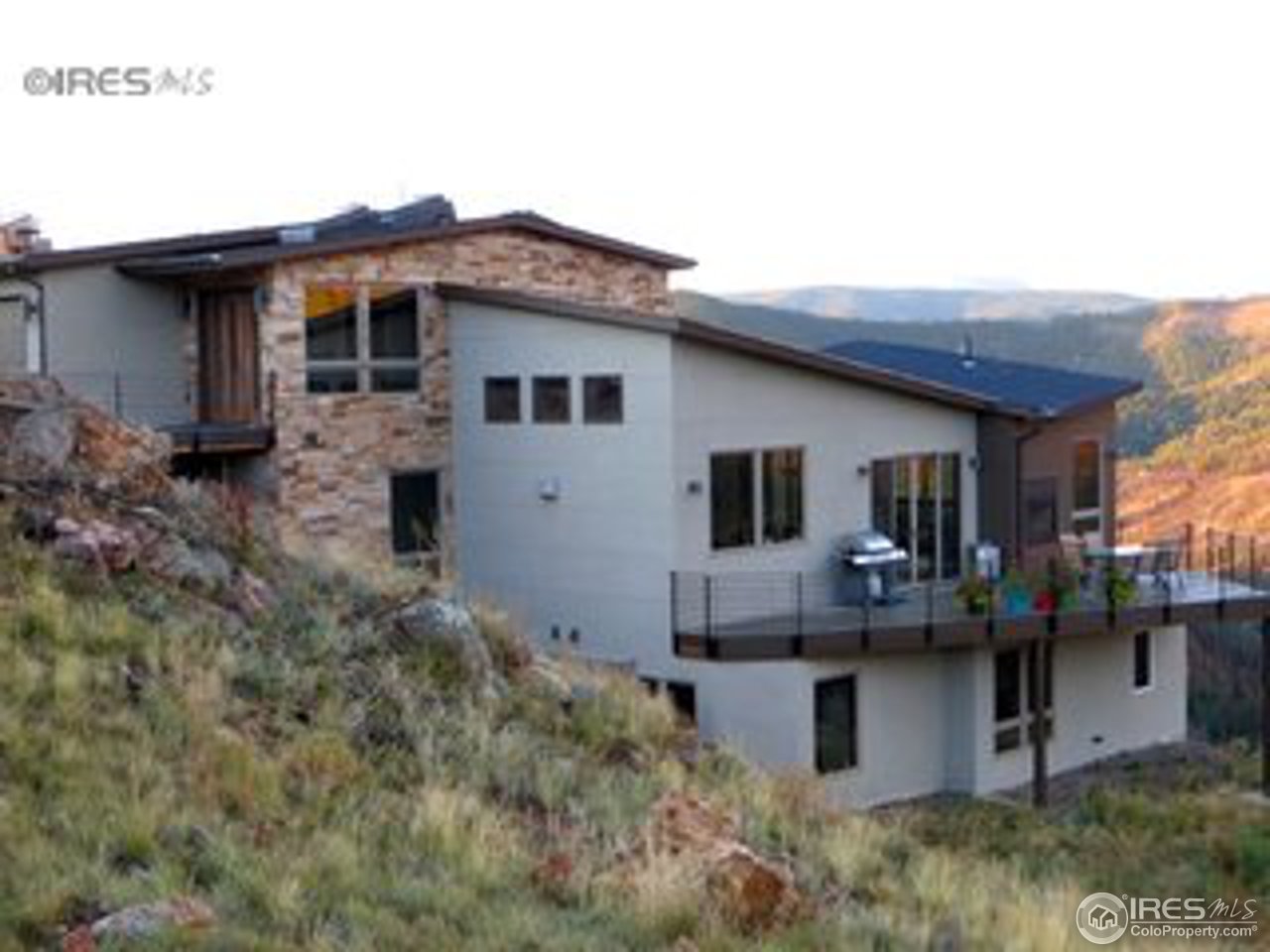 a view of house with outdoor seating space