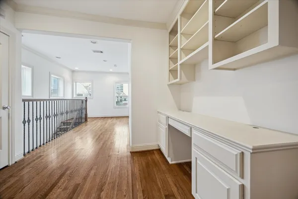 a view of entryway with wooden floor