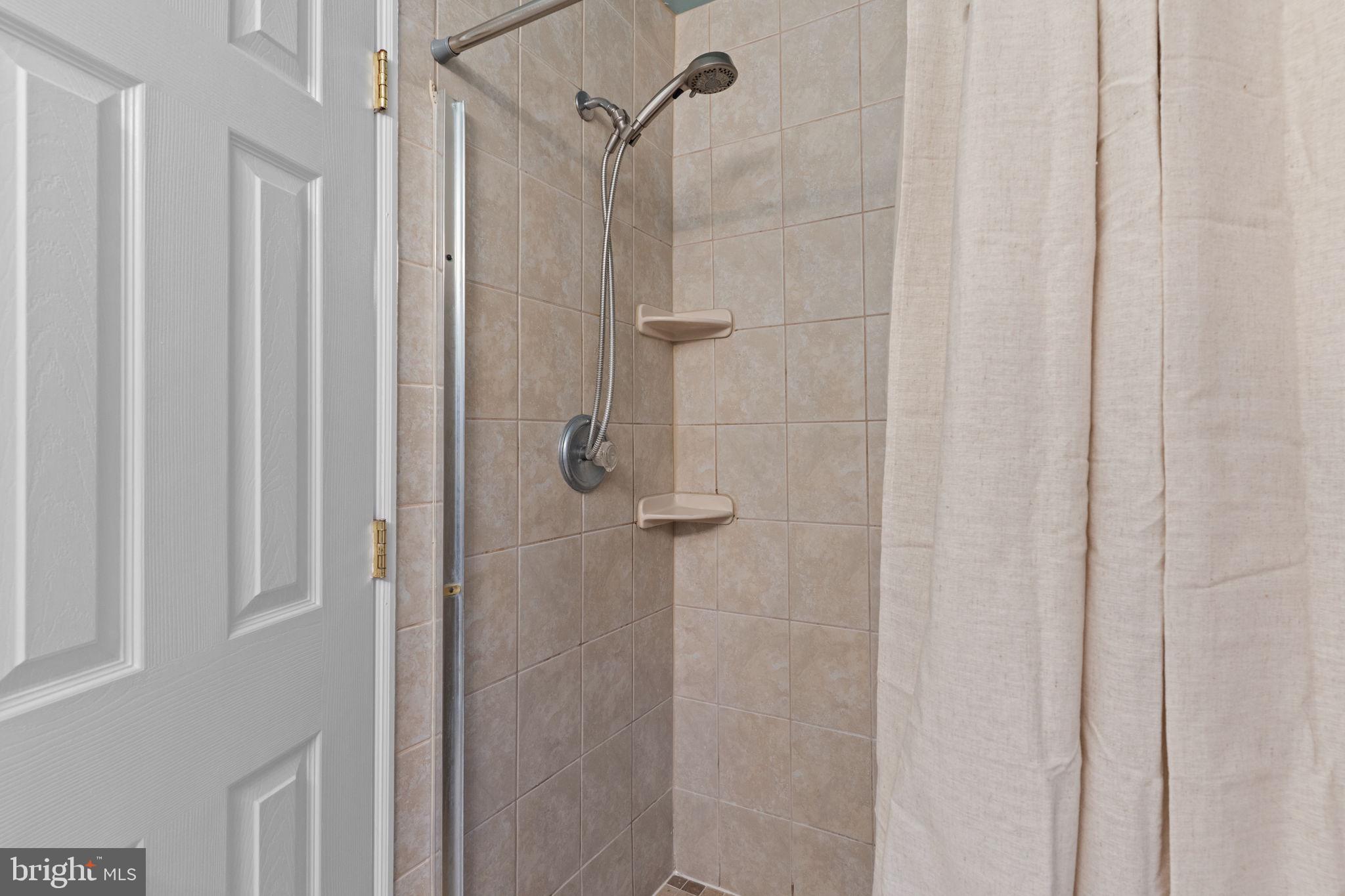 17 Highland Drive Yardley, PA 19067 - Photo 17 of 29 a bathroom with a shower