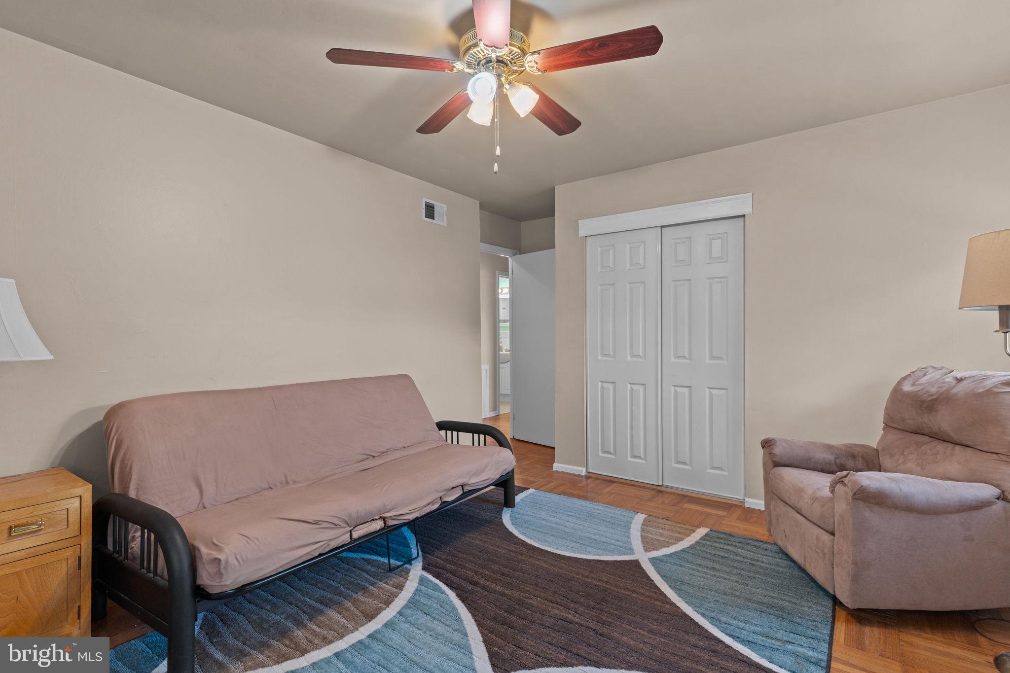 17 Highland Drive Yardley, PA 19067 - Photo 20 of 29 a living room with furniture and a rug