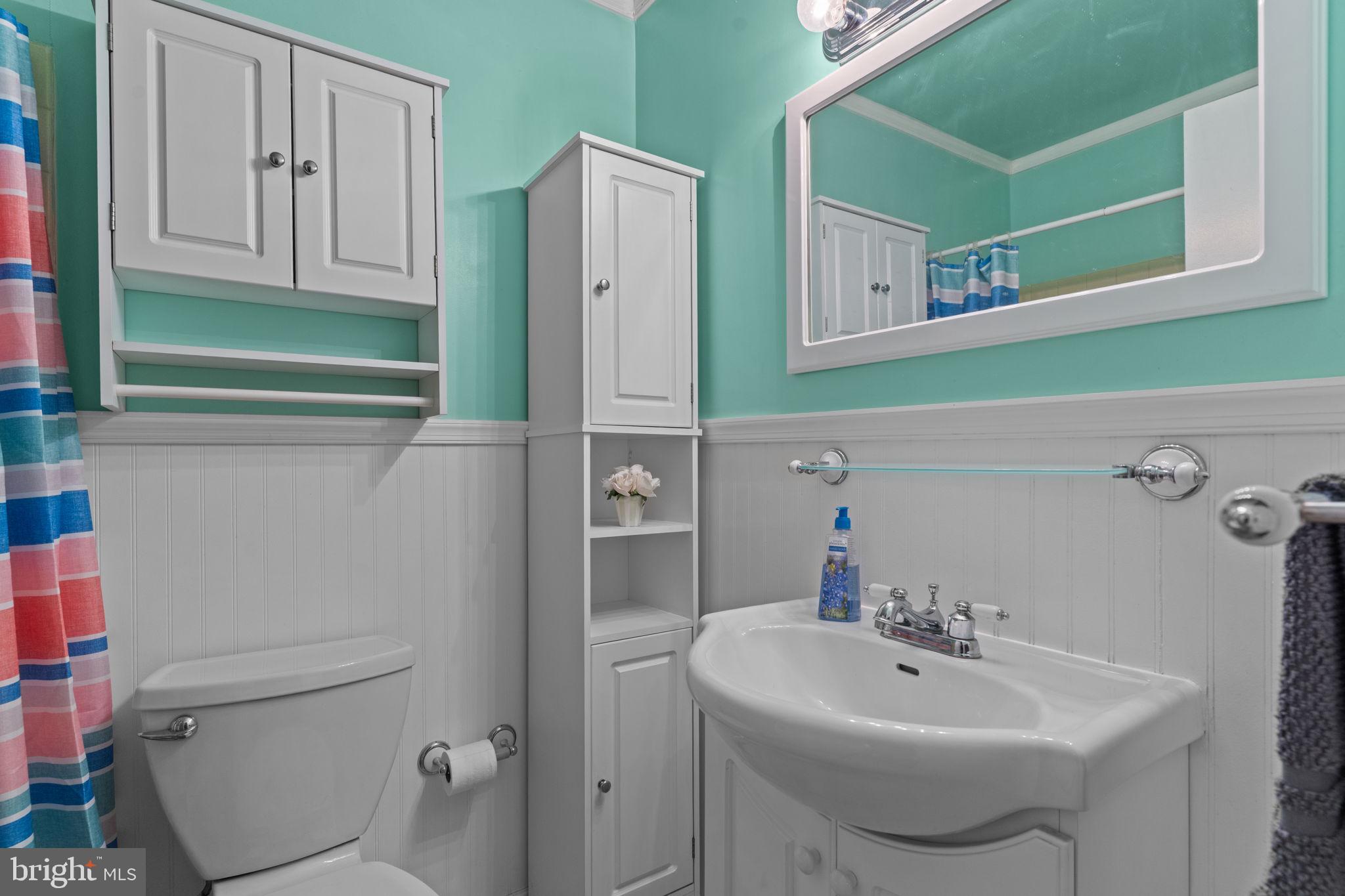 17 Highland Drive Yardley, PA 19067 - Photo 21 of 29 a bathroom with a sink and a mirror