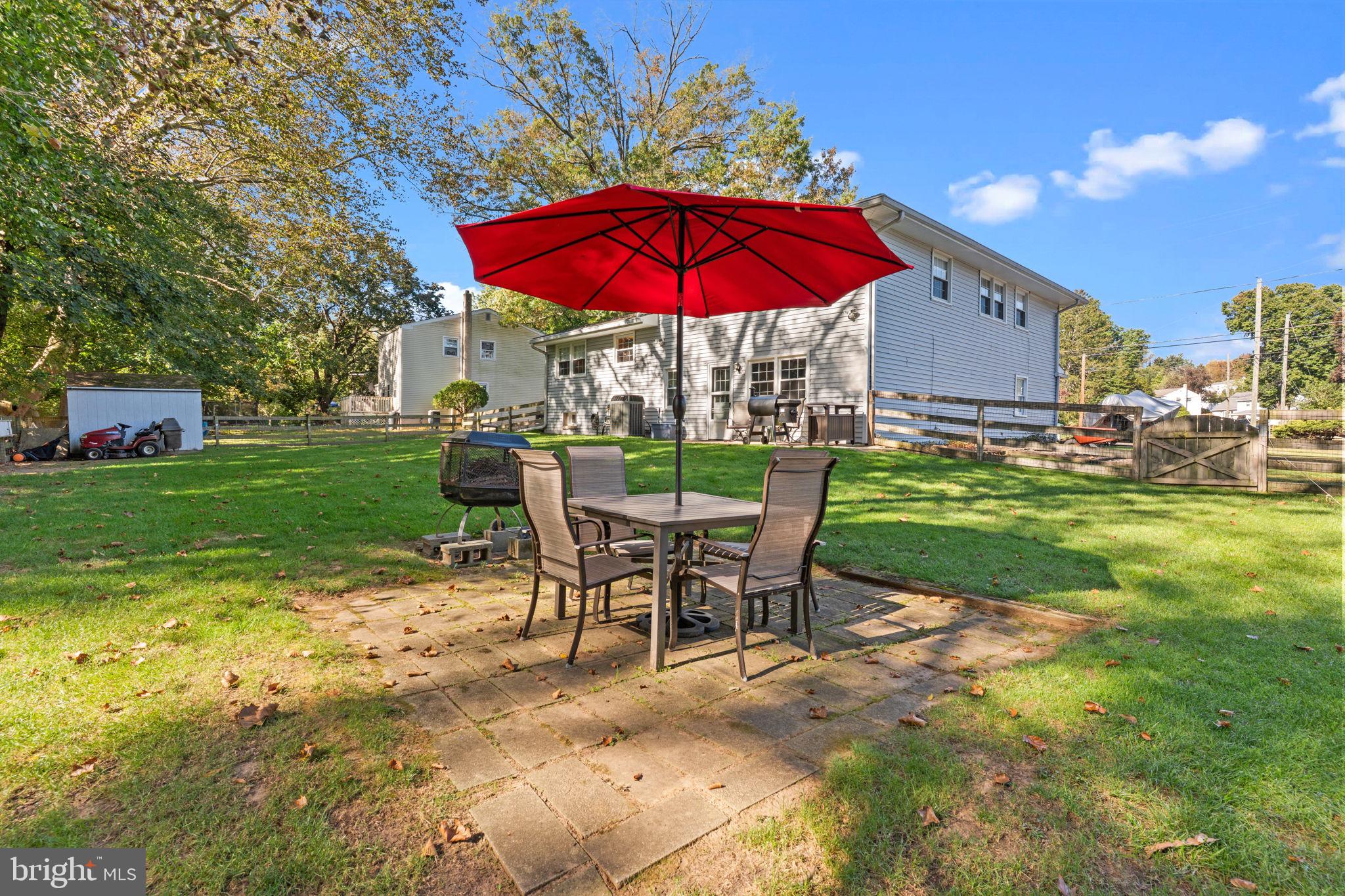 17 Highland Drive Yardley, PA 19067 - Photo 24 of 29 a view of a house with backyard sitting area and garden